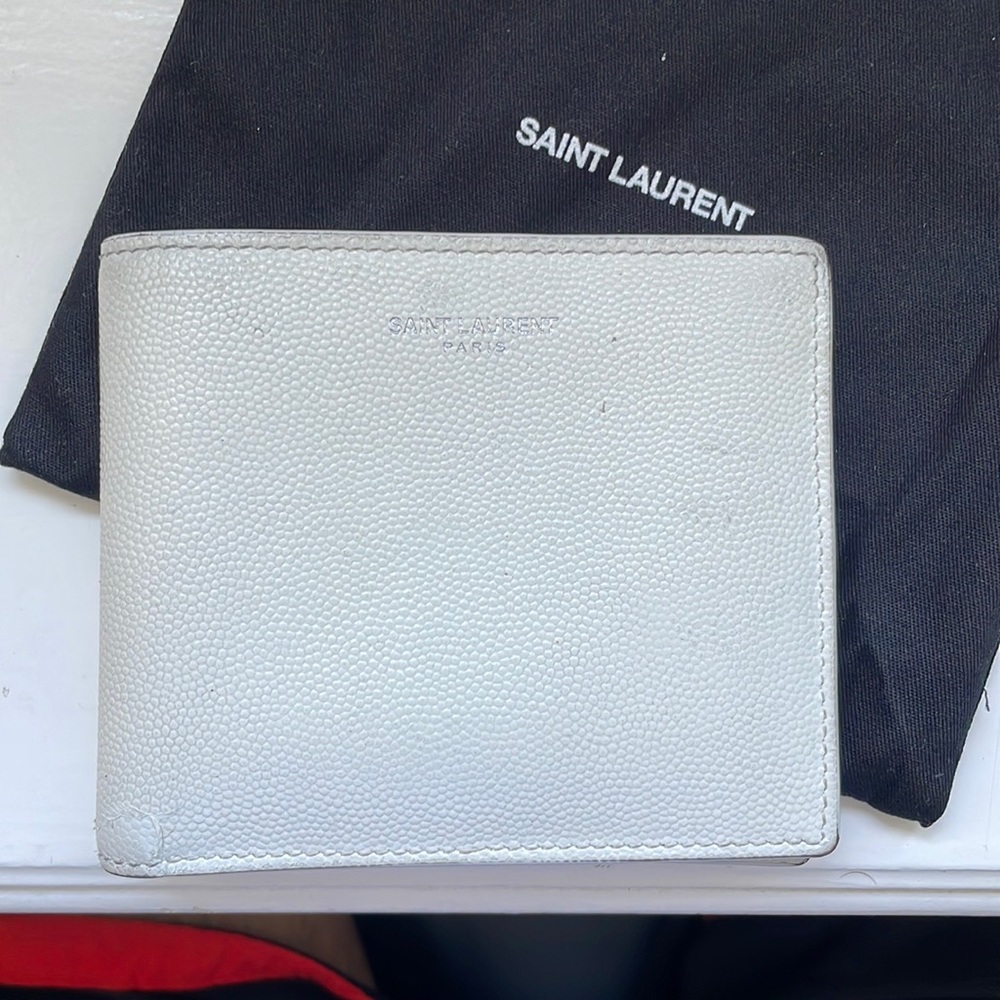 Pre-owned leather bifold wallet.